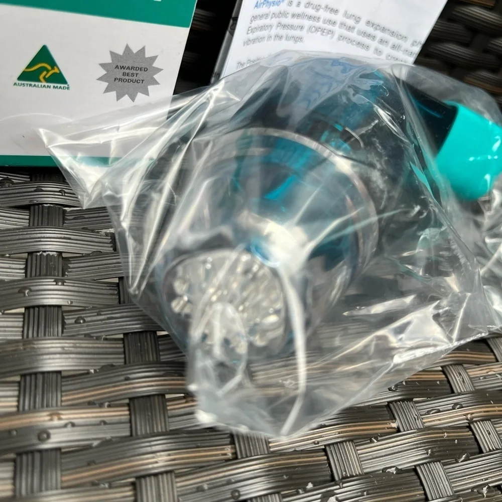 New sealed AirPhysio Health and Wellness Breathing device no box